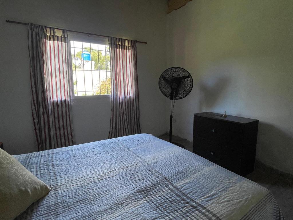 Ein Bett oder Betten in einem Zimmer der Unterkunft Casa de verano