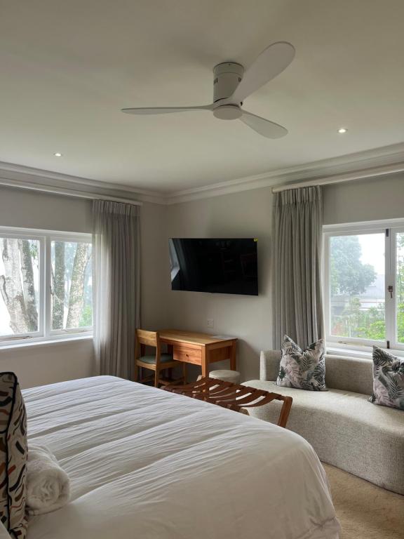 Postel nebo postele na pokoji v ubytování 7 on Churchill Guest House