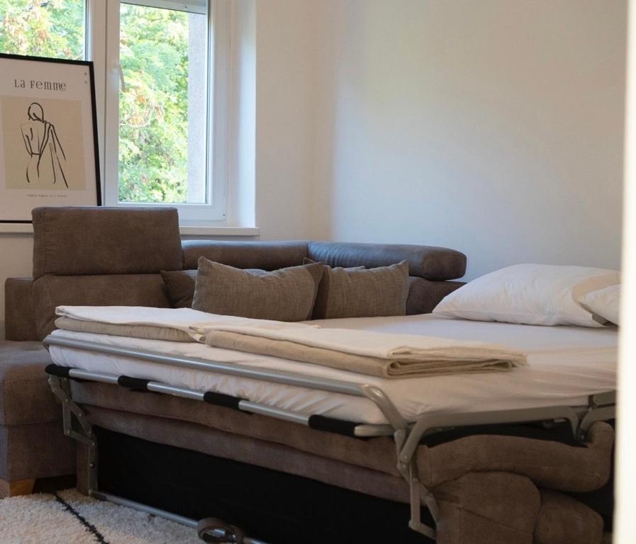 Ένα ή περισσότερα κρεβάτια σε δωμάτιο στο Centar Lux