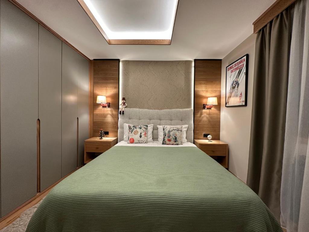 Ένα ή περισσότερα κρεβάτια σε δωμάτιο στο Apartment MonteBreza Spa