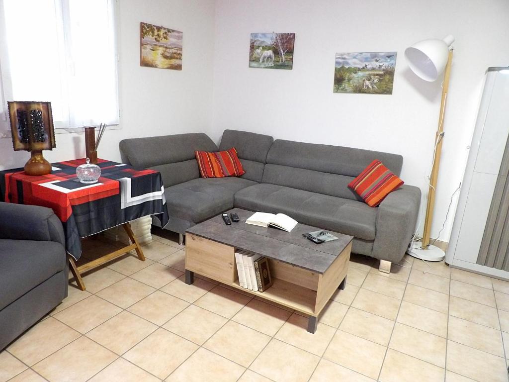 Et opholdsområde på Appartement tout confort Piscine Parking