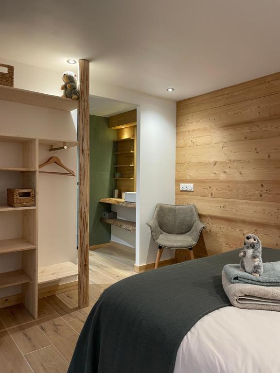 En eller flere senge i et værelse på La marmotte qui papote