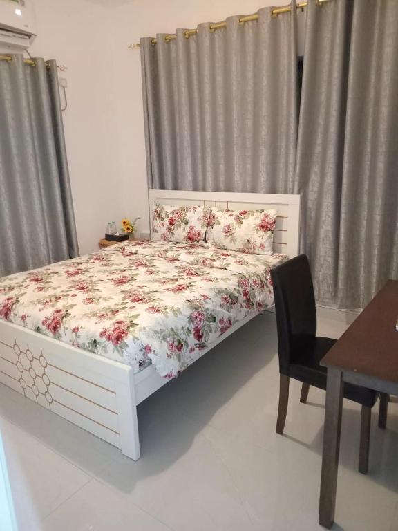 Ένα ή περισσότερα κρεβάτια σε δωμάτιο στο Emira Haven