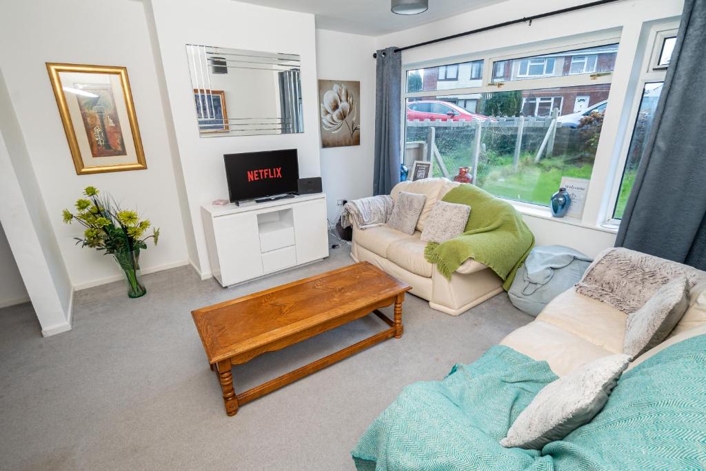 Et opholdsområde på Heol Yr Eos Family Getaway