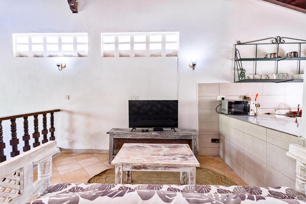 Et tv og/eller underholdning på Villagio Coconut Beachstays