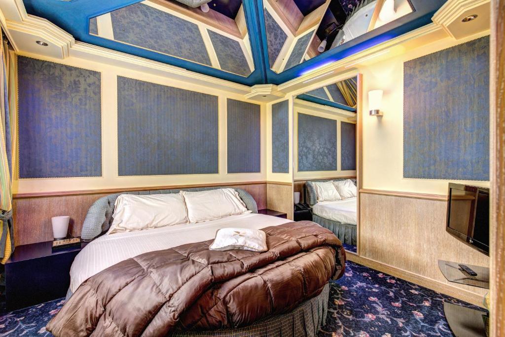 Postel nebo postele na pokoji v ubytování Hotel Motel Regal