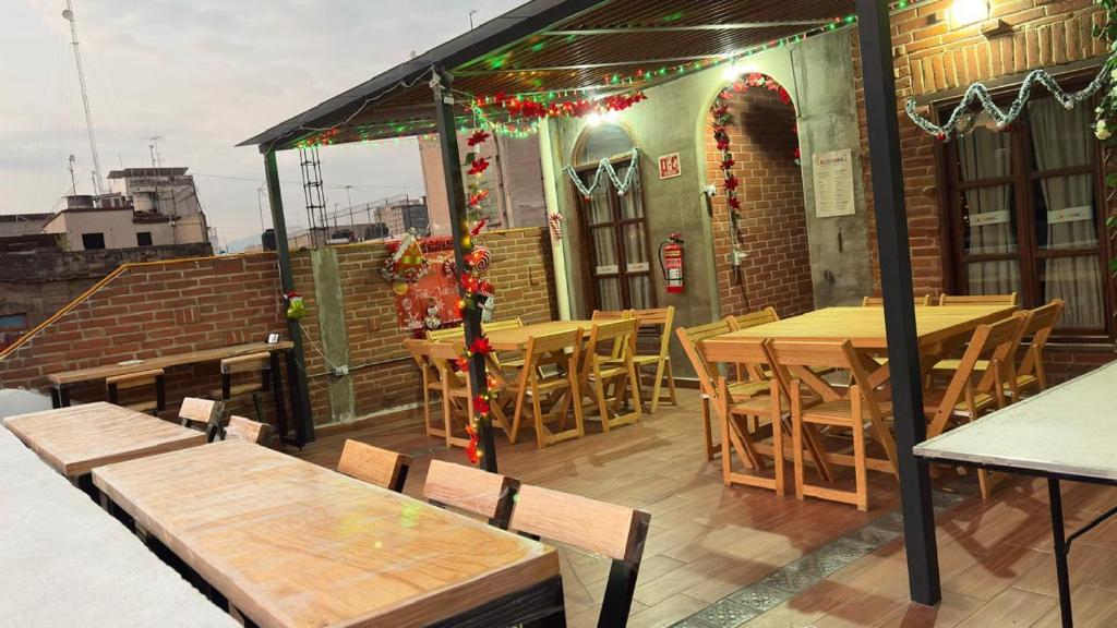 En restaurant eller et andet spisested på Hostal KEMMM