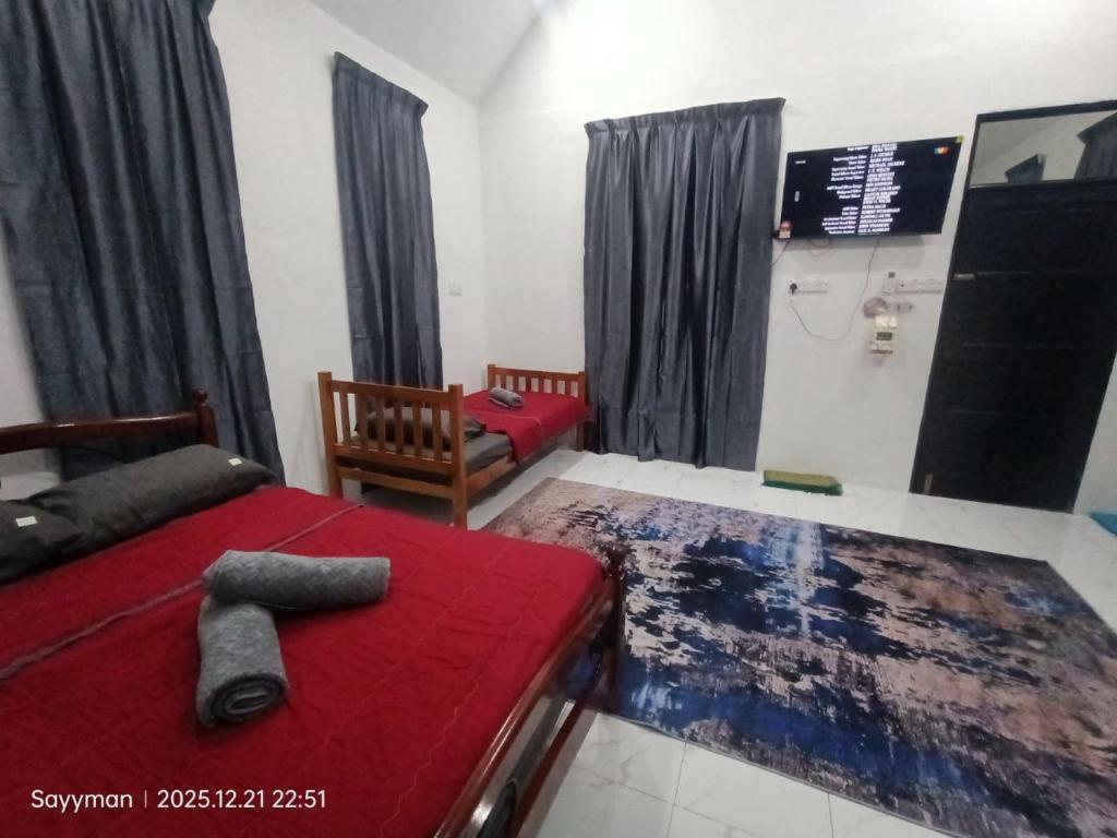 En eller flere senge i et værelse på Moksu Garden Tiny House jerteh