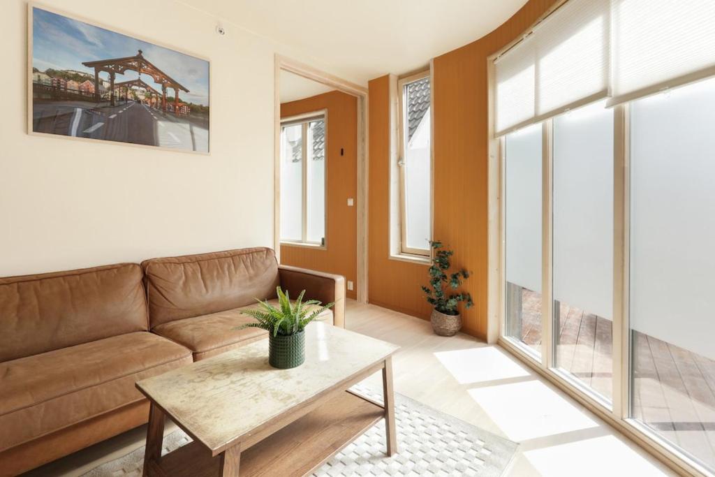 Et opholdsområde på Elegant 1-Bed Apt in City Centre