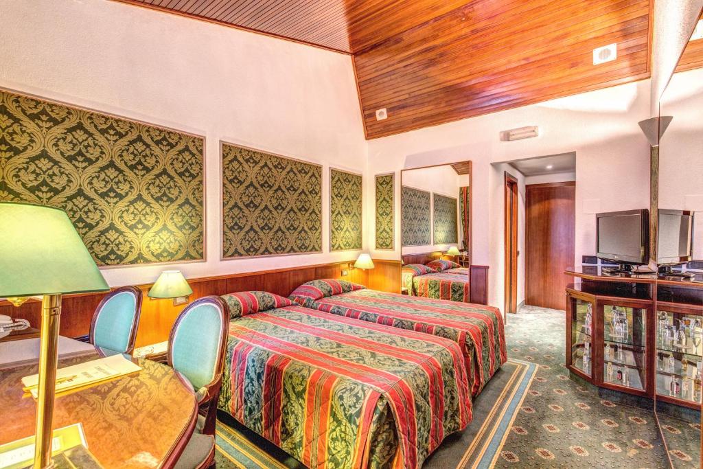 TV a/nebo společenská místnost v ubytování Hotel Motel Regal