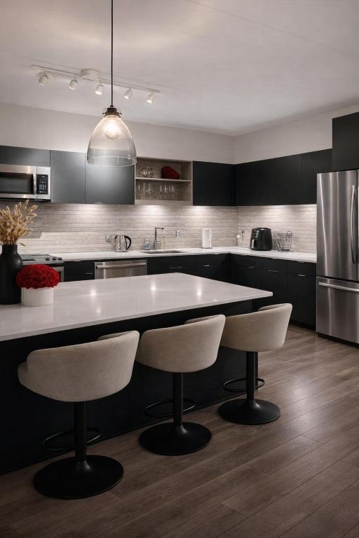 a kitchen with a large white table and chairs at SuCasa in Arlington