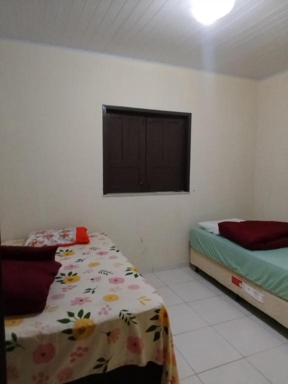 Postel nebo postele na pokoji v ubytování Fagner