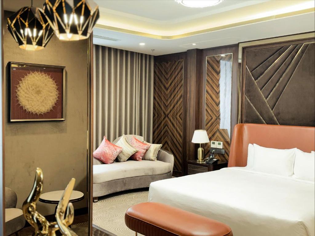 Giường trong phòng chung tại Muong Thanh Luxury Cao Bang