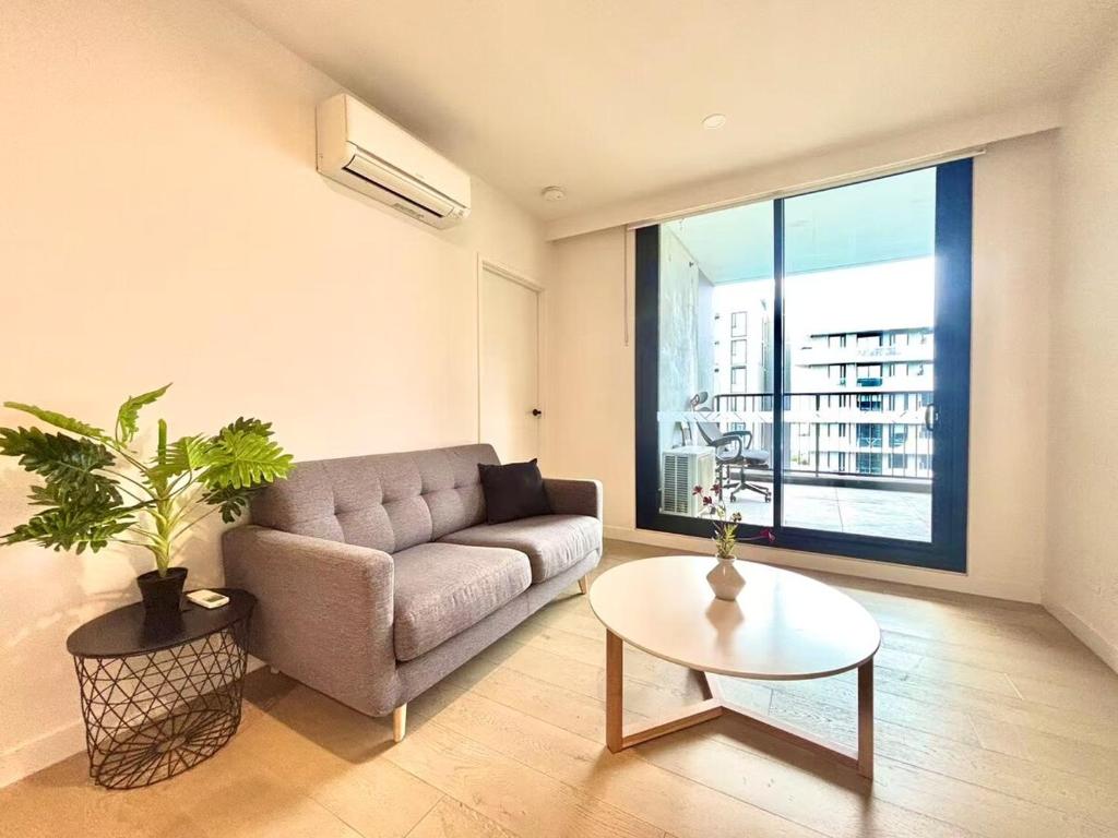 Posezení v ubytování Stylish High-Rise at M-City Monash Uni & Cinema