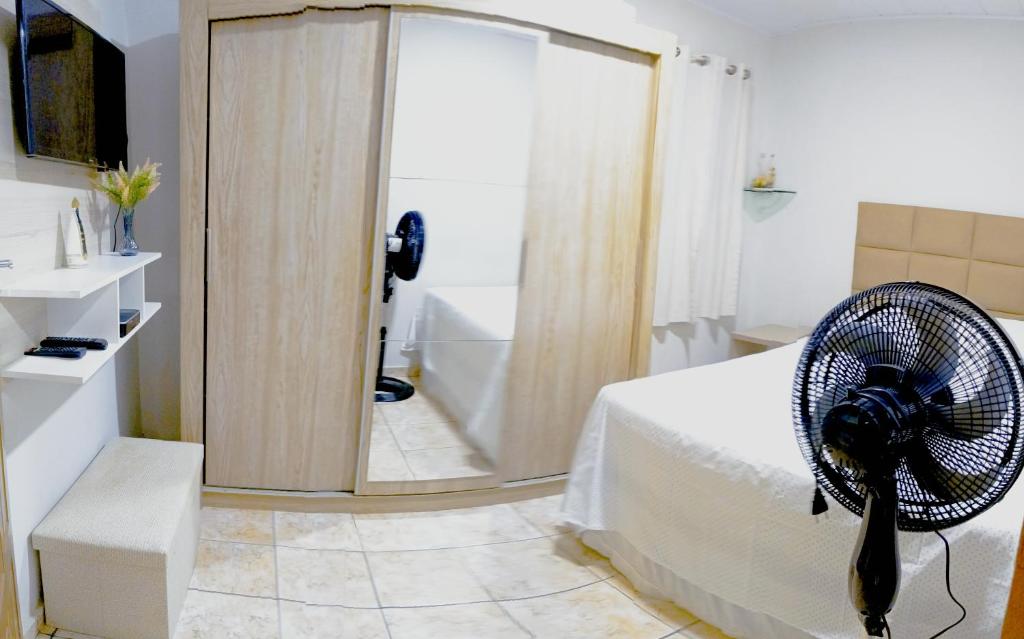 En eller flere senge i et værelse på Casa aconchegante ao lado da Igreja Matriz- Bananeiras-PB