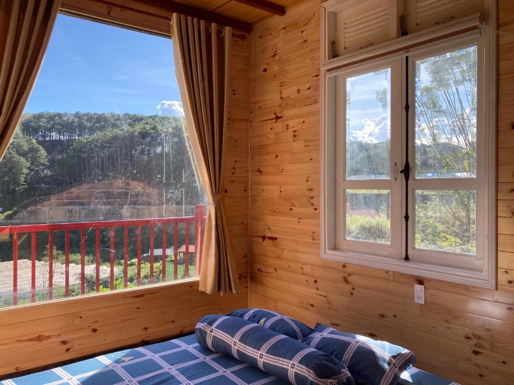 Postel nebo postele na pokoji v ubytování Lưng Đồi Homestay