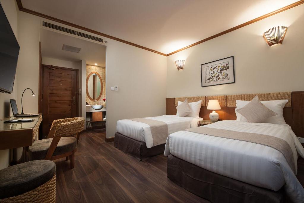 Deluxe Triple Room (3 Singles or 1 Double + 1 Single)