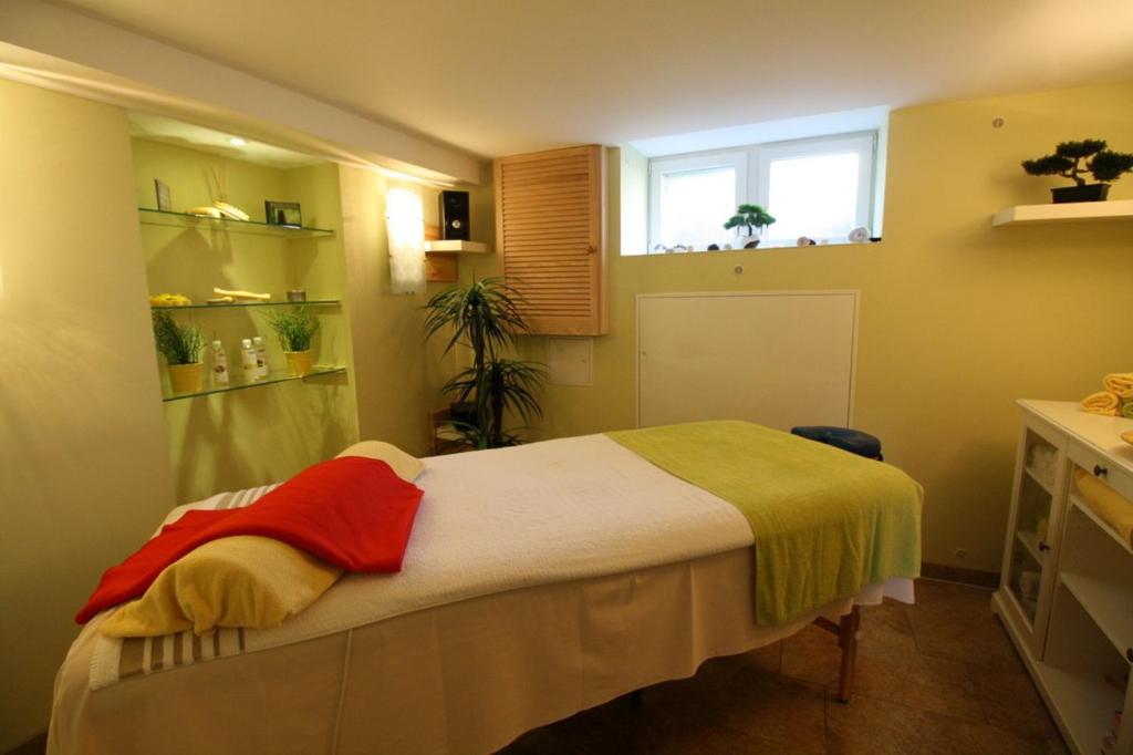Postel nebo postele na pokoji v ubytování Hotel Brockenstübchen
