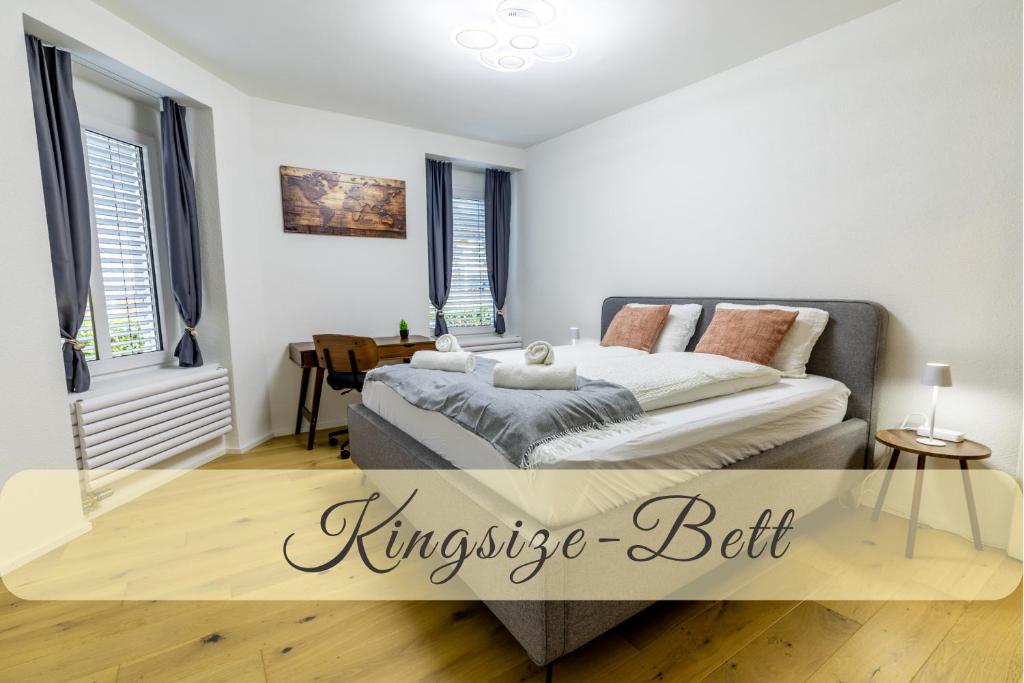 En eller flere senge i et værelse på Jasminkas Host 3 - Stadtwohnung mit Küche & gratis Parkplatz