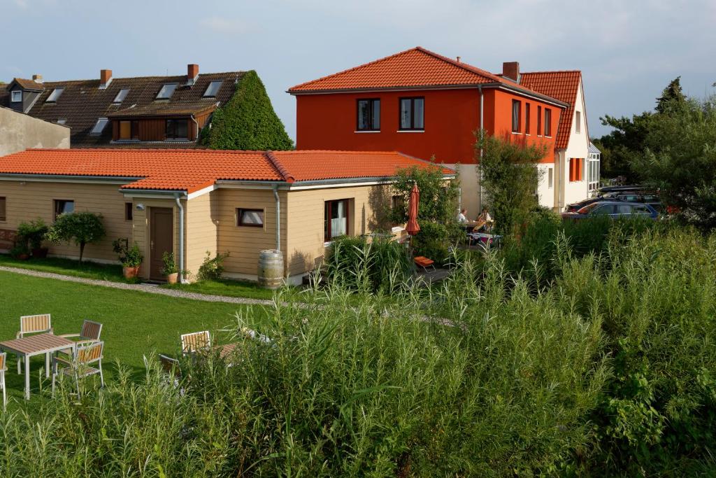 Zahrada ubytování Haus Achtern Diek in erster Reihe am Meer