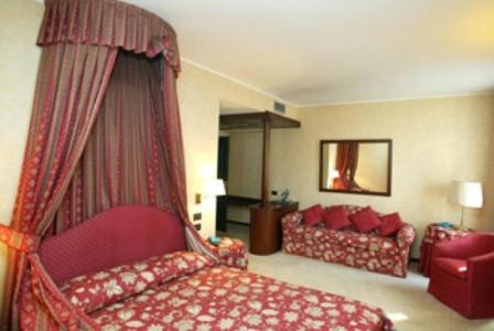Postel nebo postele na pokoji v ubytování Hotel Due Mondi