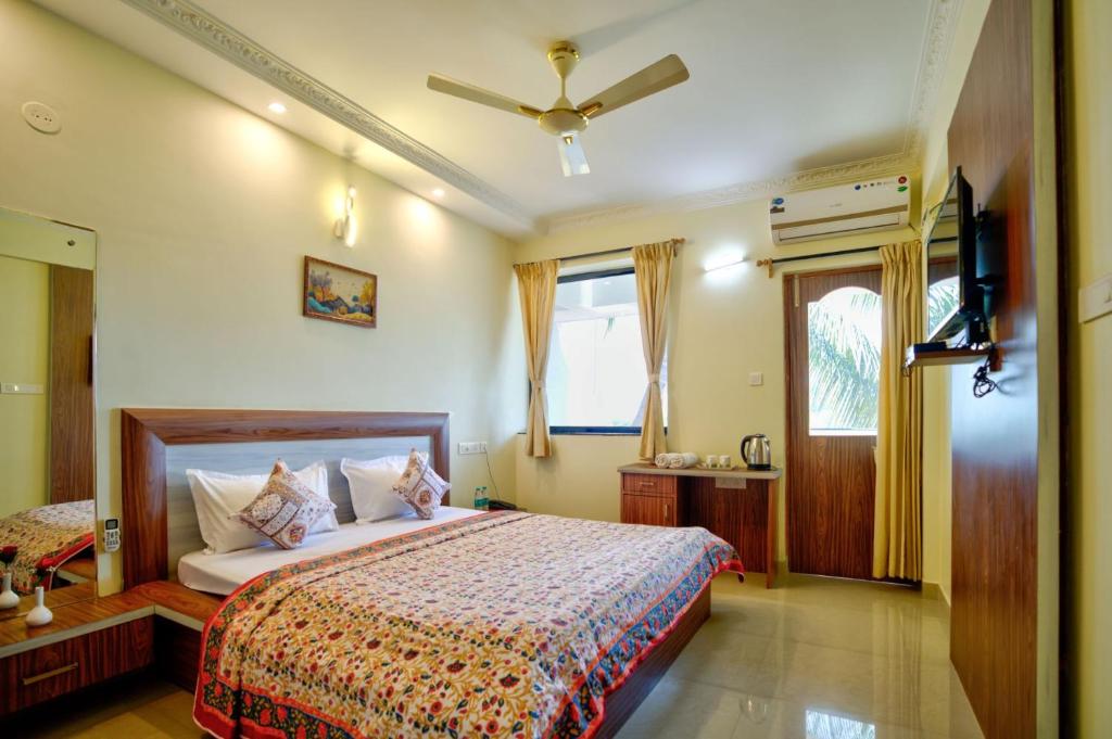 Postel nebo postele na pokoji v ubytování Eufregina Resort & Spa - South Goa
