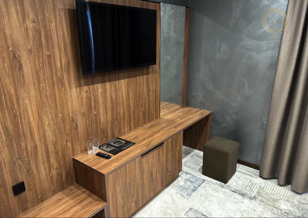 Et tv og/eller underholdning på Quan Qonaq Uii