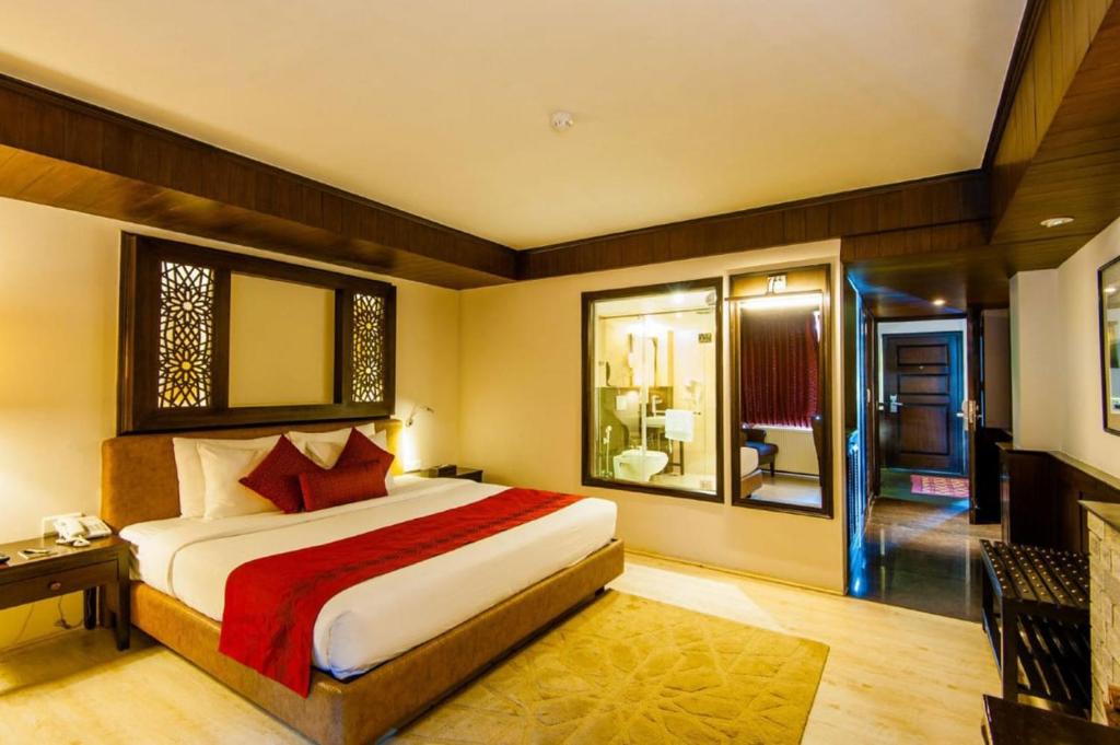 En eller flere senge i et værelse på The Vintage Gulmarg