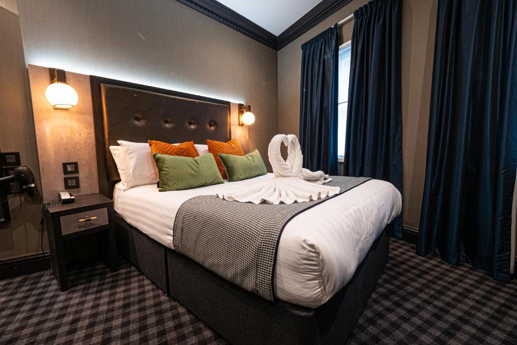 Postel nebo postele na pokoji v ubytování The House of Toby