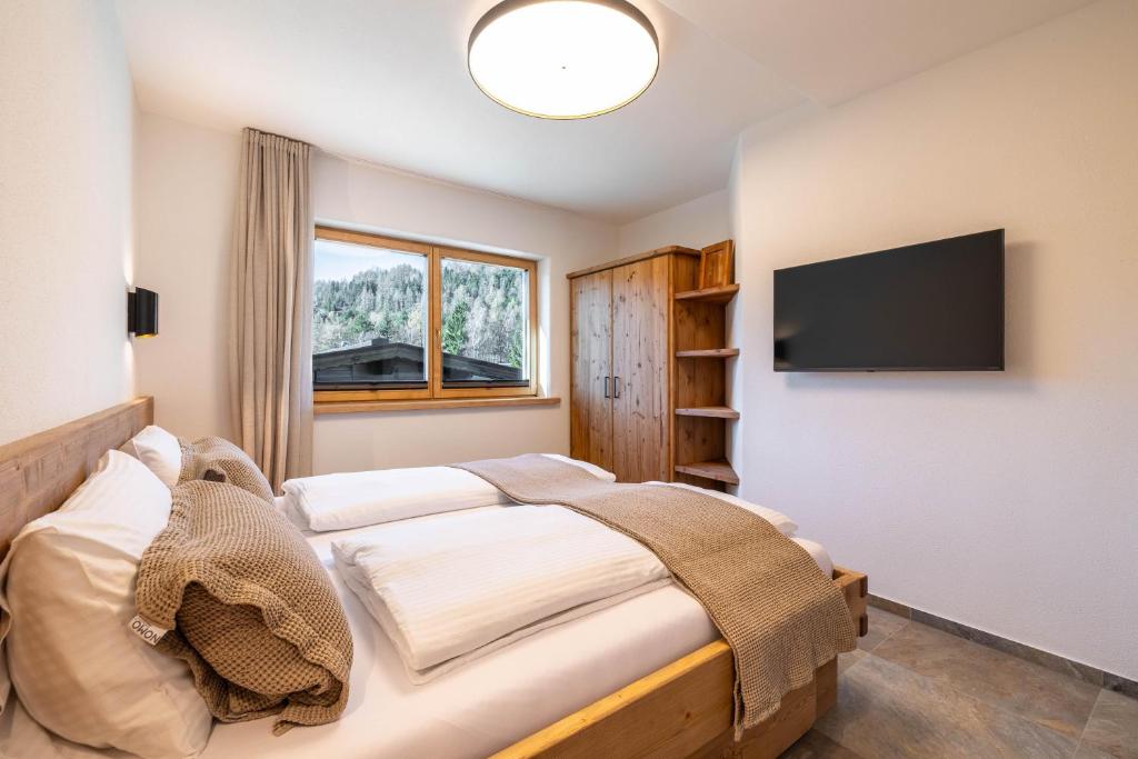 TV a/nebo společenská místnost v ubytování Appartementhaus Moritz