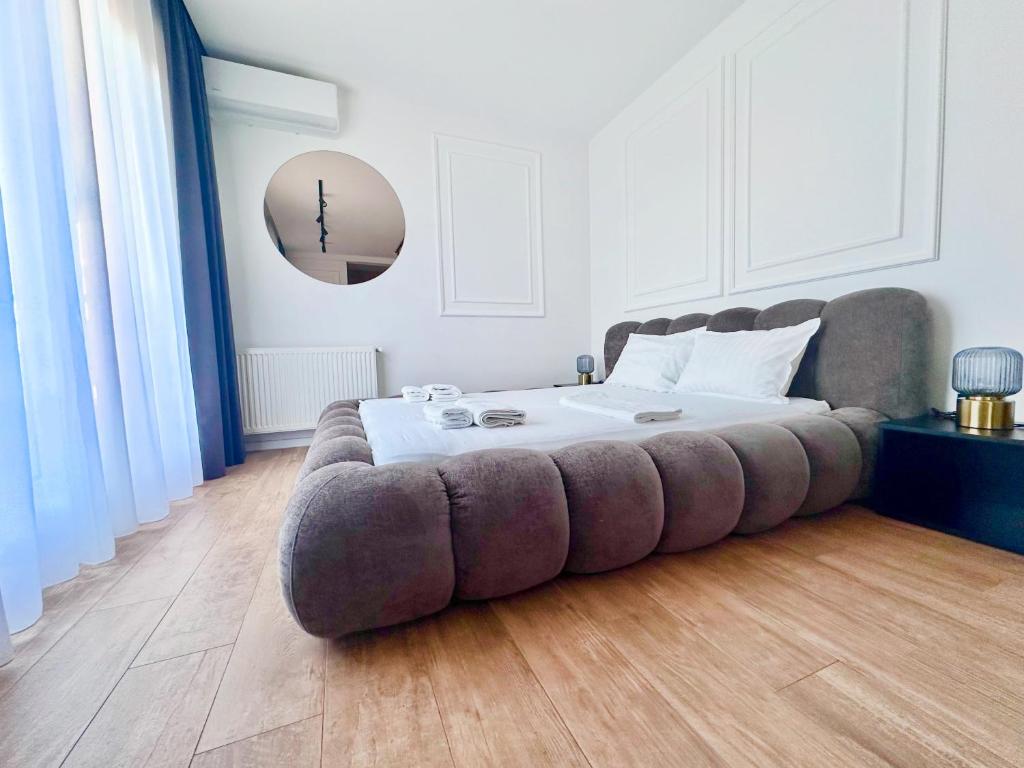 Postel nebo postele na pokoji v ubytování Zuma Lux Apartments