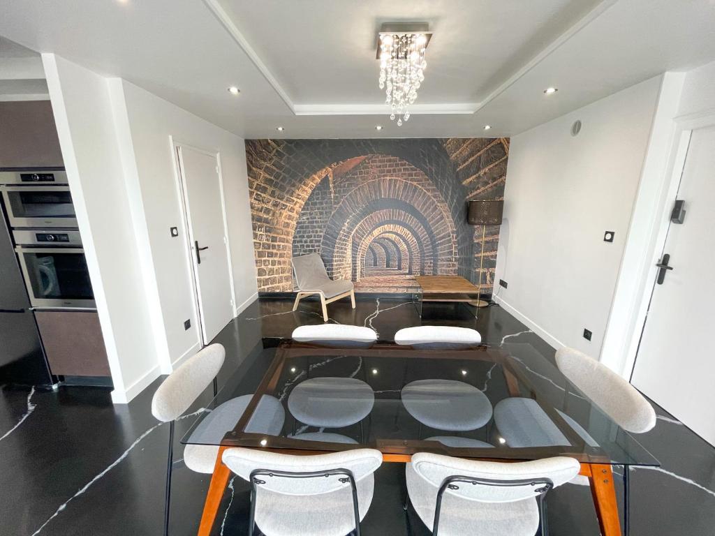 Η κουζίνα ή μικρή κουζίνα στο Atypaluxe Appartement 3 chambres