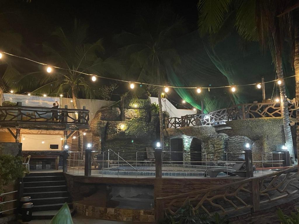 a set up for a party at night with lights at Coastal Haven Resort in Siquijor
