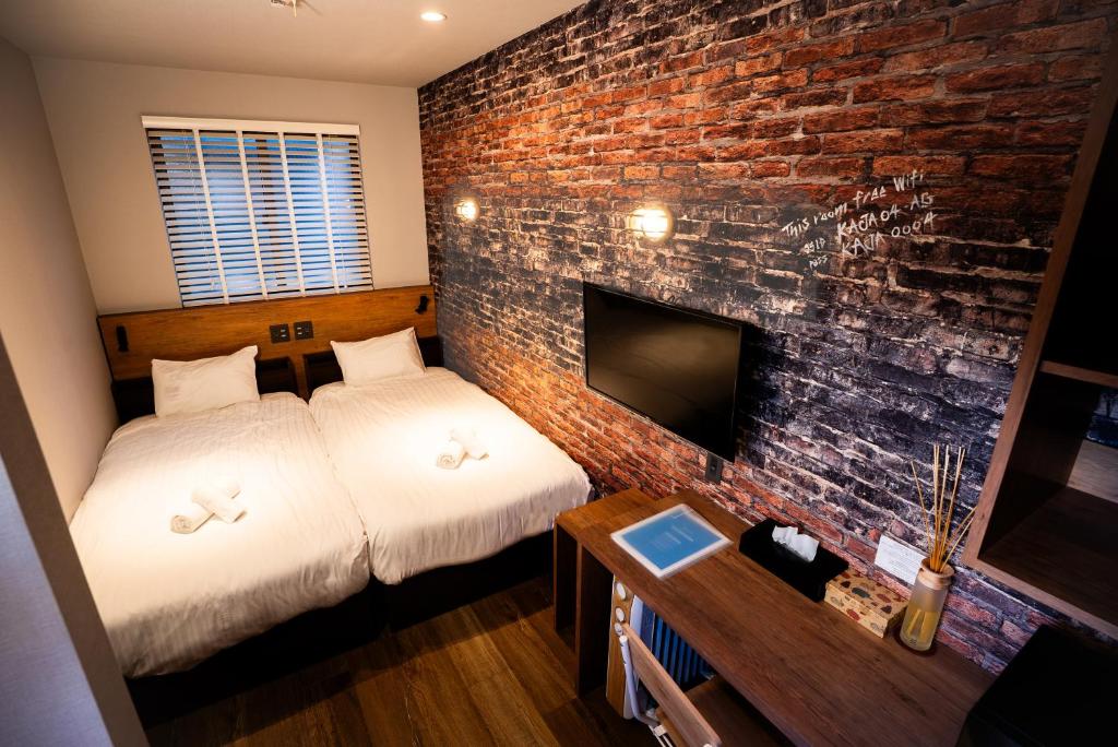 En eller flere senge i et værelse på KAJAhause