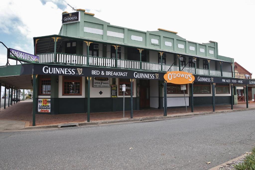 a building with a sign on the side of it at O'Dowds Hotel/Motel Rockhampton in Rockhampton