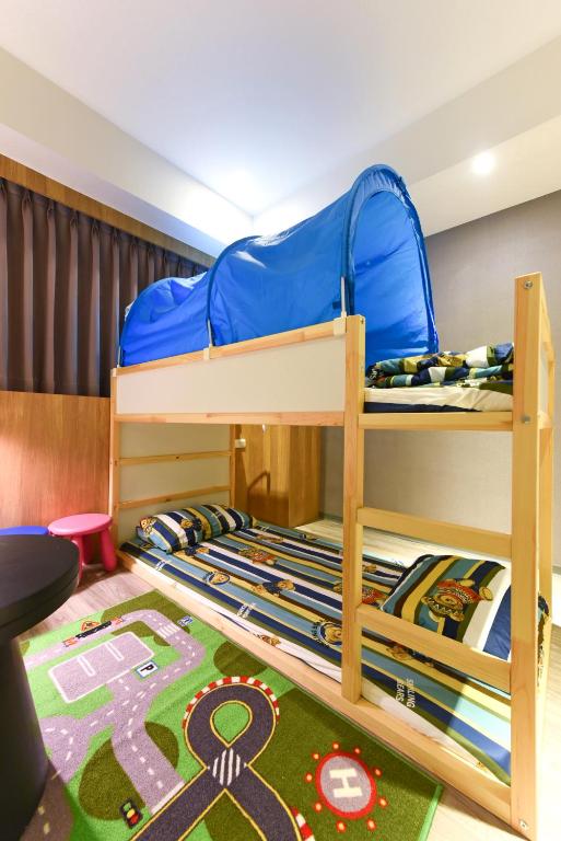 Postel nebo postele na pokoji v ubytování Blue Coast Hotel
