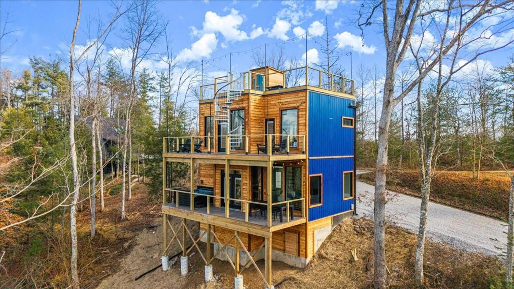 a house is being built in the woods at *Rooftop Deck*Hot Tub*Sauna*Fire Pit*Sunset Views* in Campton
