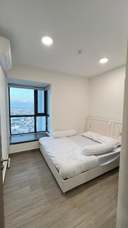 Llit o llits en una habitació de Hea Va Condo