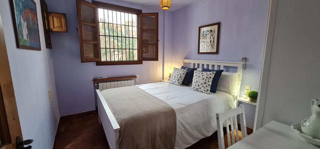 Postel nebo postele na pokoji v ubytování La tinaja 64 luxury views