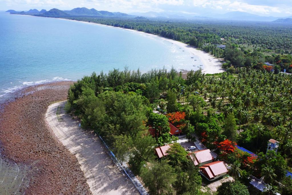 an aerial view of a beach and the ocean at Rocky Point Resort in Thap Sakae