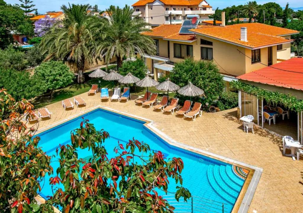 an image of a swimming pool at a resort at Paras Sun Hotel & Apartments in Ialysos