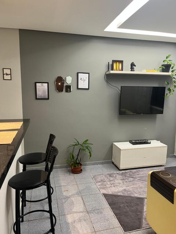 Et tv og/eller underholdning på Casa aconchegante em Aracaju na Aruana