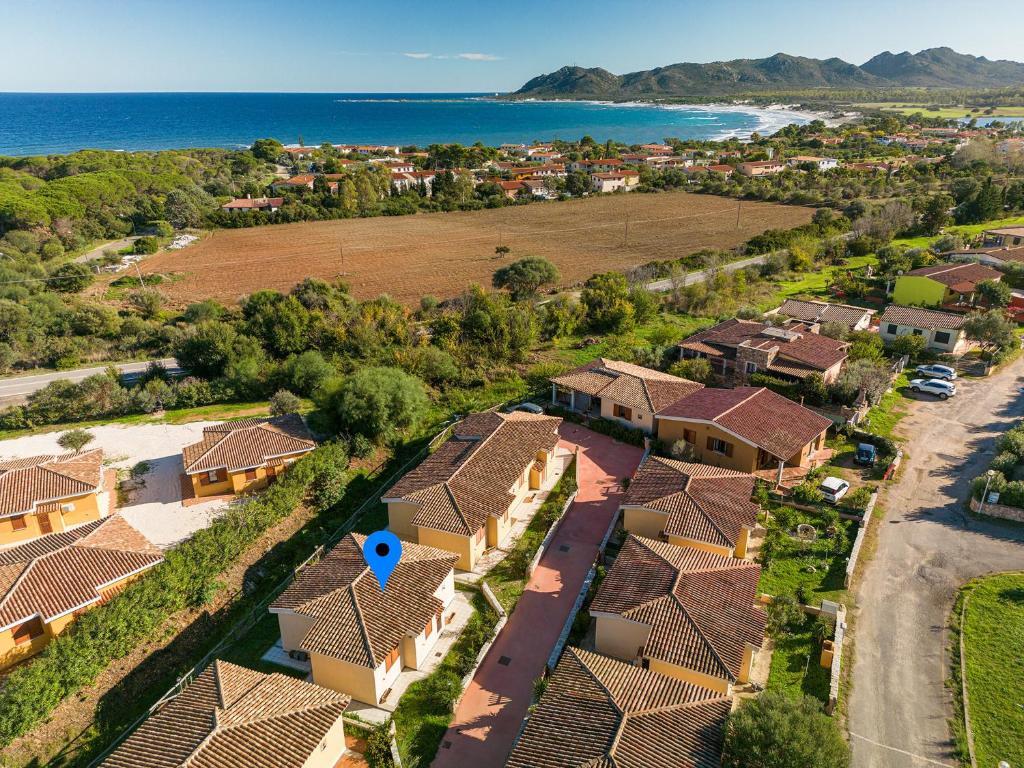 an aerial view of a residential neighborhood with houses at AffittaSardegna - Appartamenti Appentos in Capo Comino