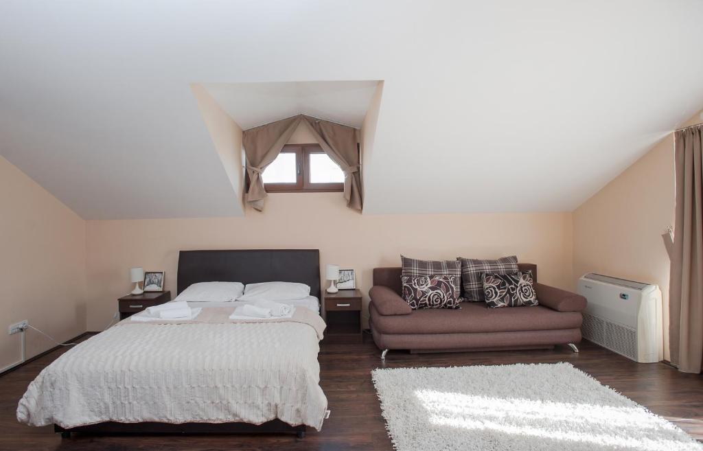 Postel nebo postele na pokoji v ubytování Apartman