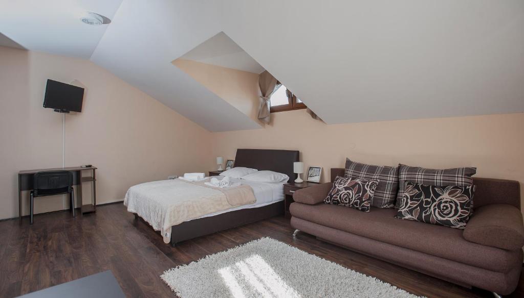 Postel nebo postele na pokoji v ubytování Apartman