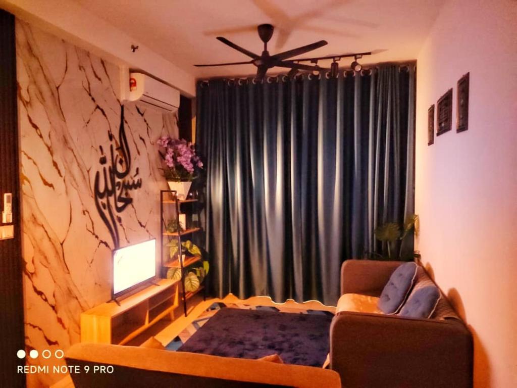 Posezení v ubytování Faeizal Homestay