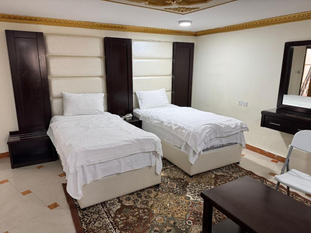 Llit o llits en una habitació de الملز