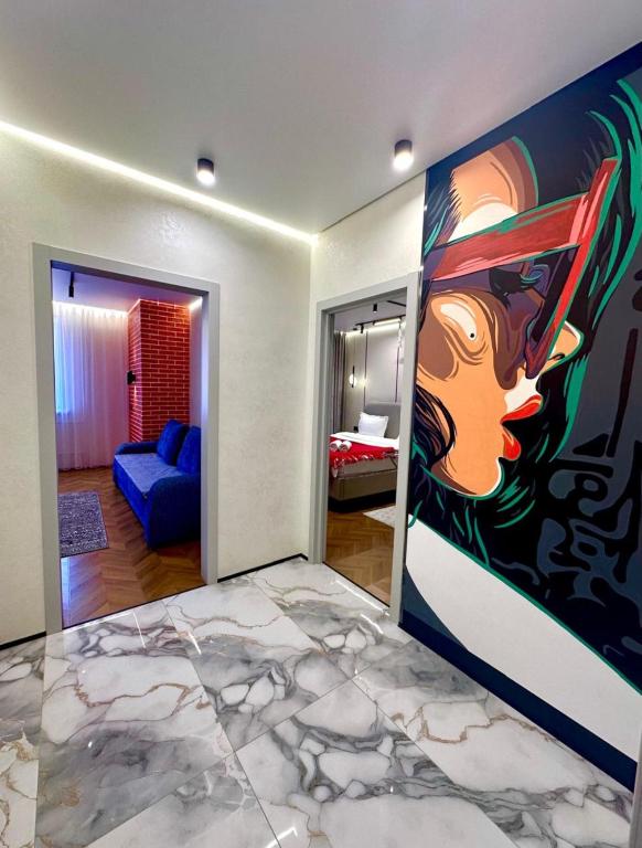 Postel nebo postele na pokoji v ubytování Стильная квартира в ЖК Абай 2