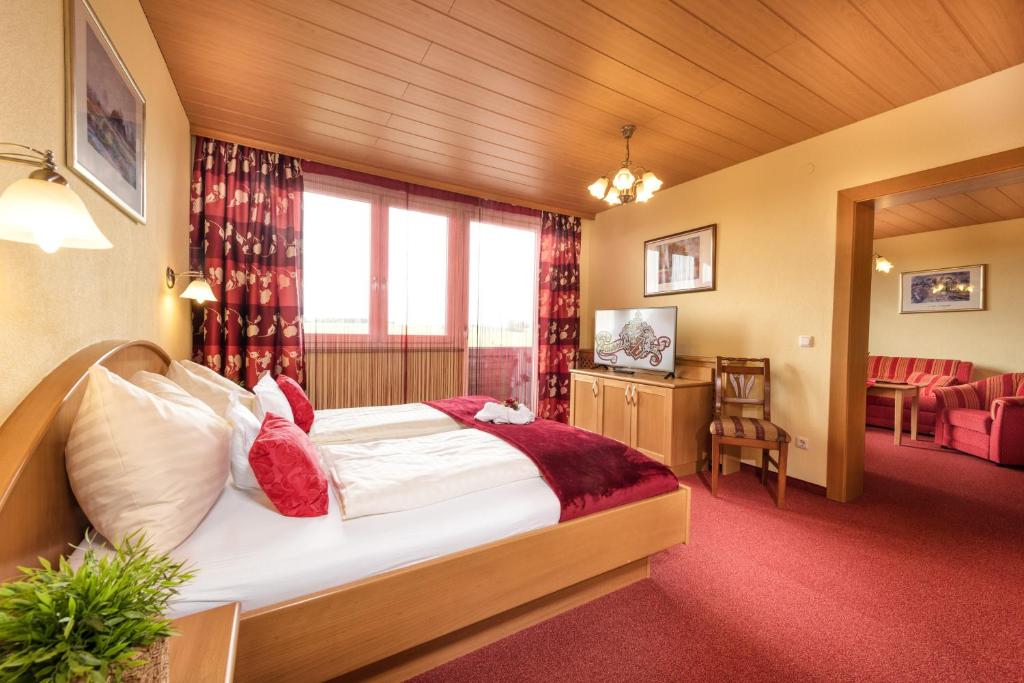 Televízia a/alebo spoločenská miestnosť v ubytovaní Hotel Lohninger-Schober 3 Stern Superior