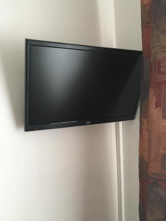 TV a/nebo společenská místnost v ubytování HARRYS City Motel
